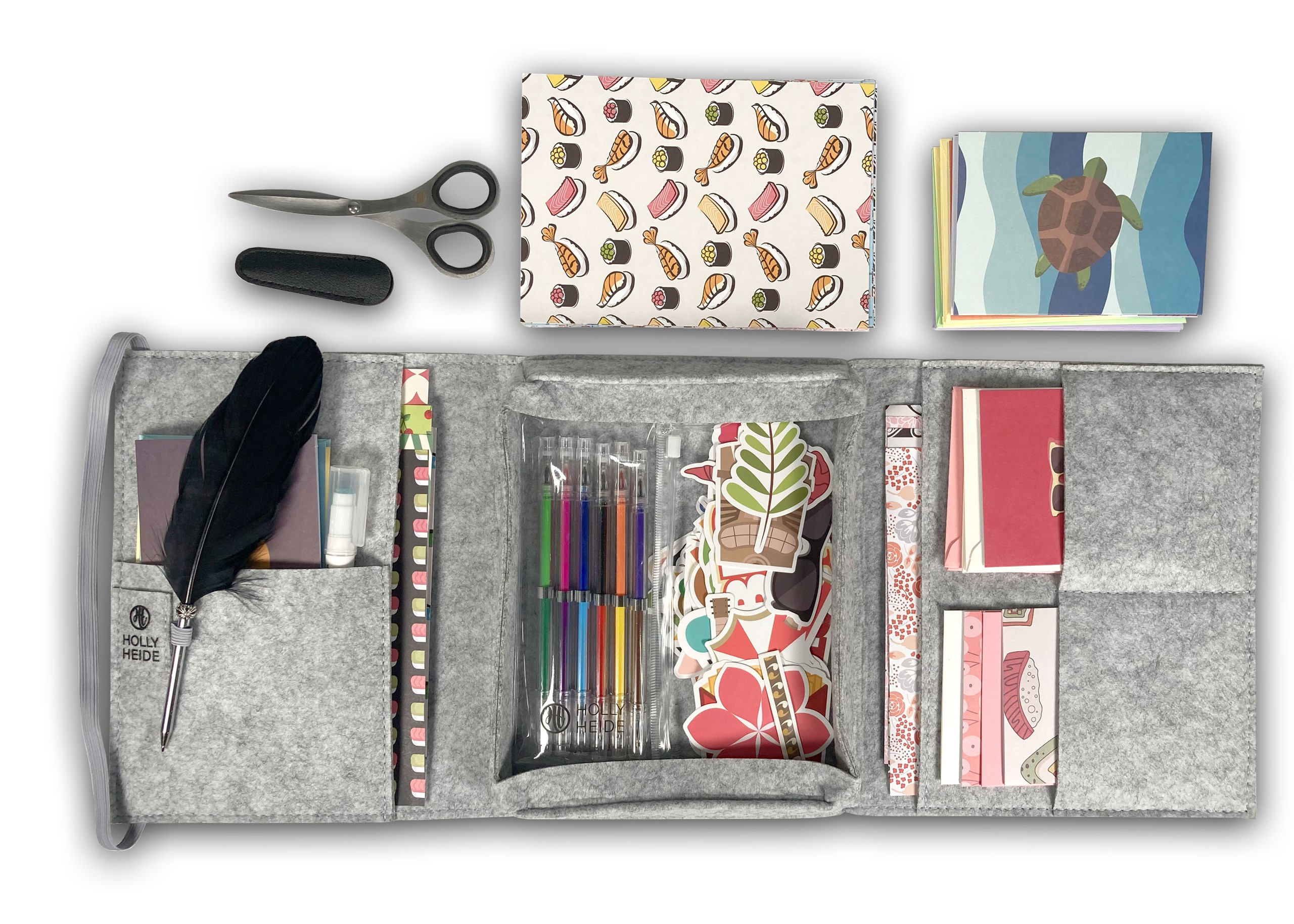 Light Gray Mobile Writing Desk open with paper, gel pens, stickers, feather pen and craft scissors
