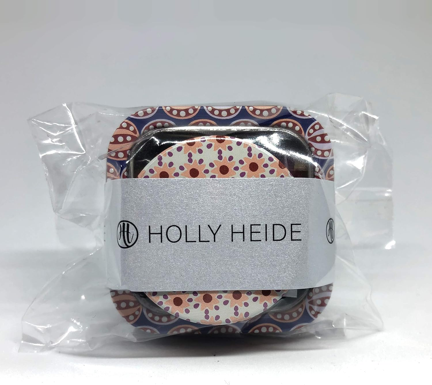 Holly Heide Berry Mix sealing wax pearls and coordinating candle tins wrapped in clear packaging with branded Holly Heide label.