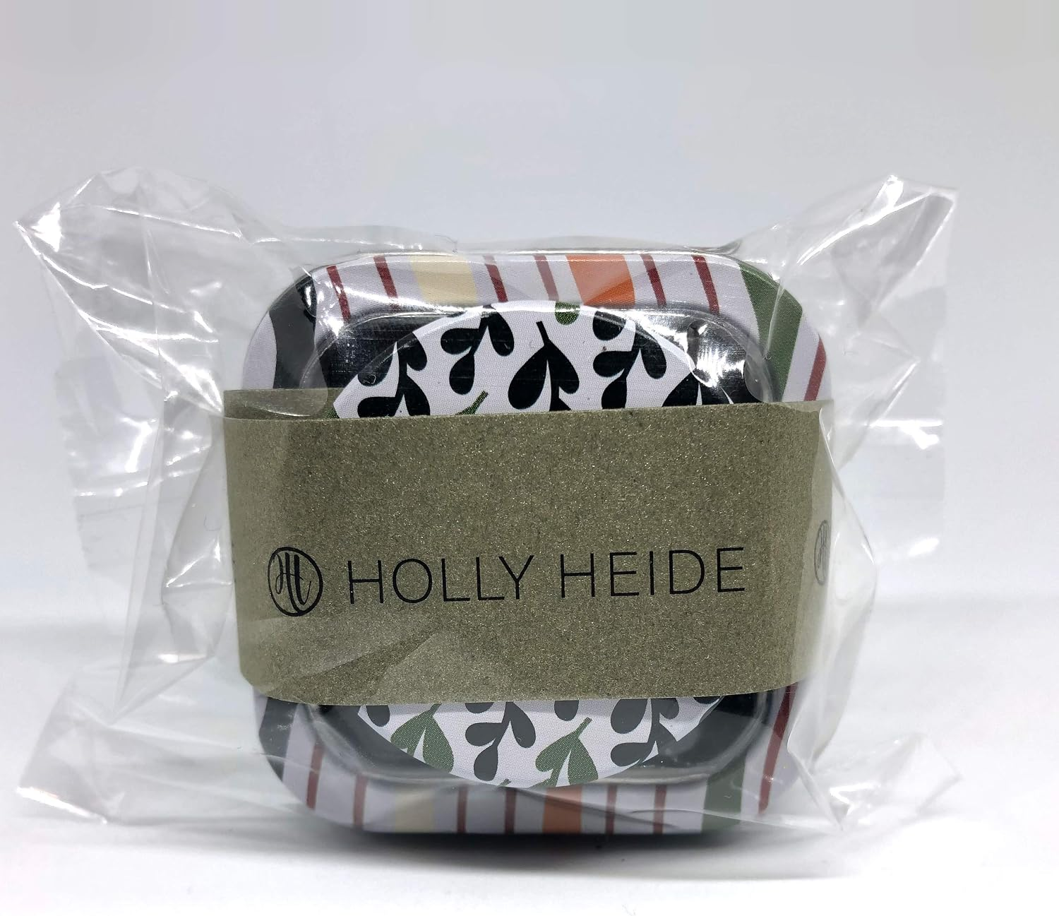 Holly Heide Botanical Mix sealing wax pearls and matching candle tins in clear packaging with branded label.