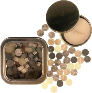 Gold Mix sealing wax pearls by Holly Heide in gold, bronze, ivory and metallic tones with reusable gold-tone storage tin and coordinating candle.