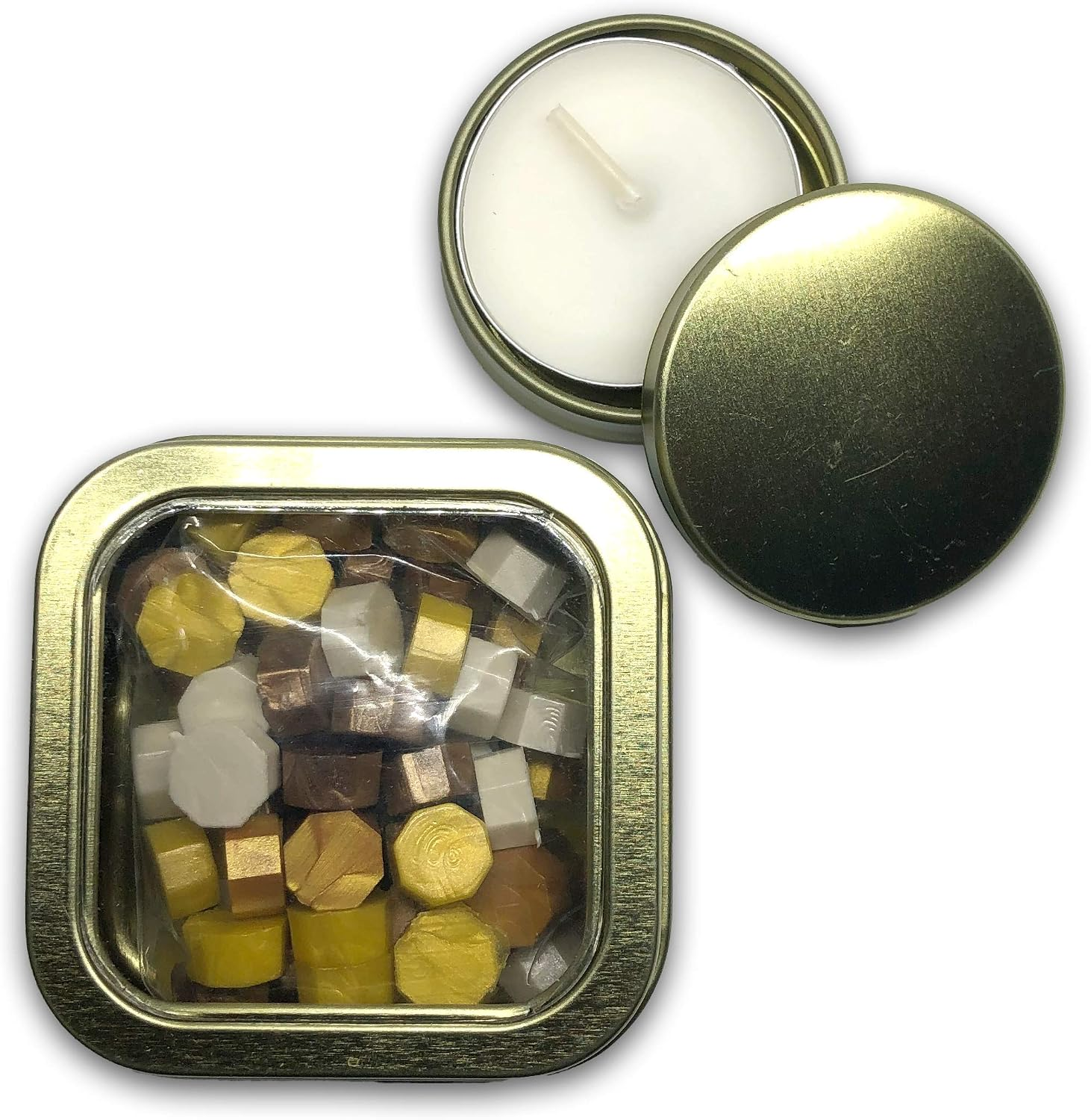 Close-up of Holly Heide Gold Mix sealing wax pearls in gold, bronze, ivory and silver tones inside a gold-tone storage tin beside a coordinating candle.