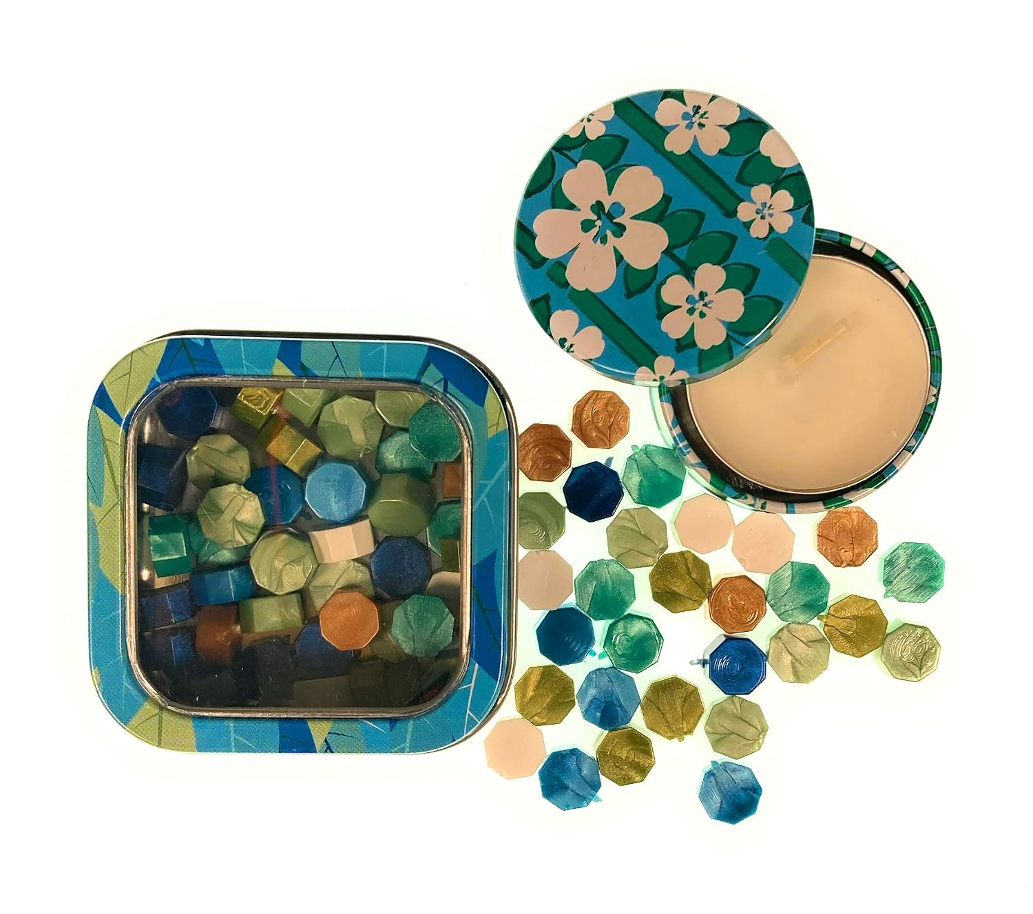 Ocean Blue wax sealing pearls in a patterned square tin beside a matching floral votive candle tin and scattered colorful wax beads.
